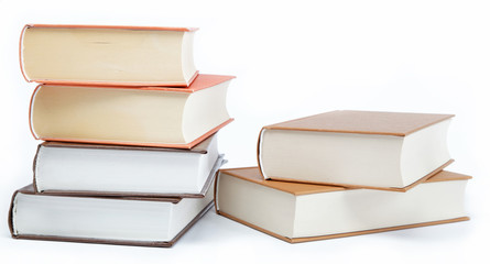 A stack of books on a white background.