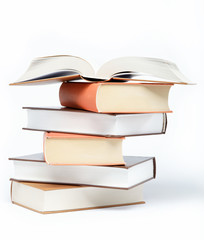 A stack of books on a white background.