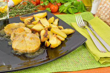 arista di maiale in salsa con patate © ppi09