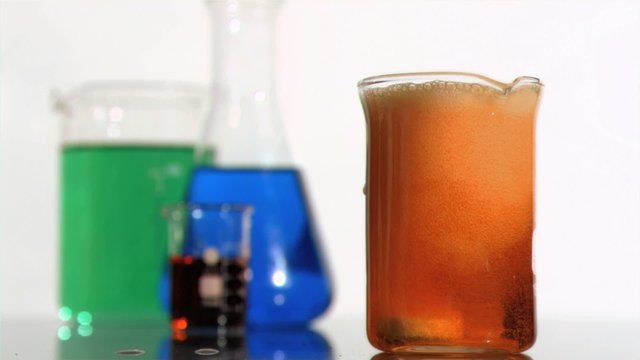 Scientific reaction occurring in super slow motion in a beaker
