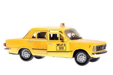 The yellow old taxi with the door open.