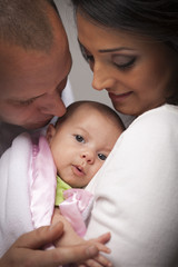 Mixed Race Young Family with Newborn Baby