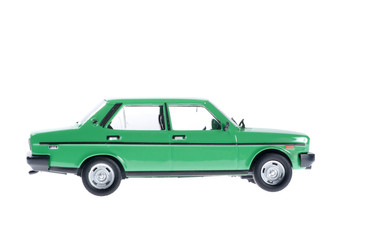 Green city old car on white background.