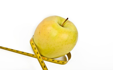 apple and measuring tape