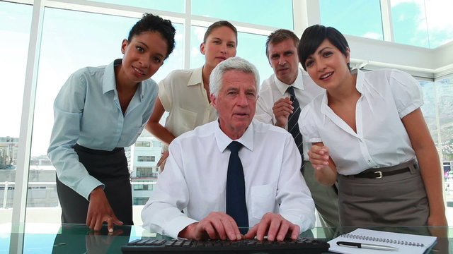 Business people working with their boss