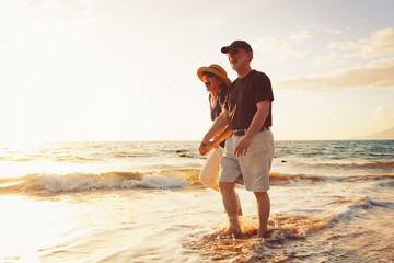 Senior Couple Enjoying Sunset at the Beach