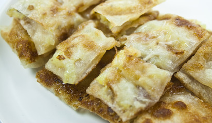 dessert style of fried roti with banana inside in Thailand