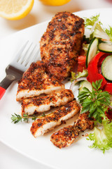Spicy chicken breasts with vegetable salad
