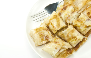 dessert style of fried roti with banana inside in Thailand