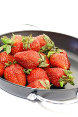 Strawberry in a frying pan.
