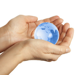 Hand holding the blue Earth