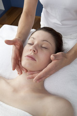 Fototapeta na wymiar rejuvenating massage of the face