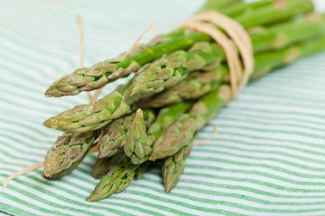 Raw fresh asparagus background