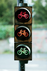 red, orange and green colour at raffic sign - bicycle road