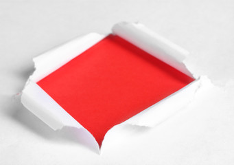 Torn paper  with red background