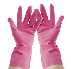 a pair of pink rubber gloves on hands