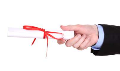 Graduation diploma in hand isolated on white