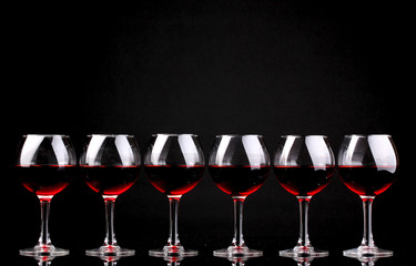 Wineglasses isolated on black