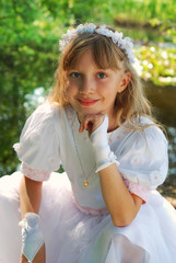 girl going to the first holy communion