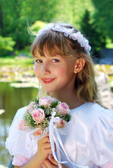 girl going to the first holy communion