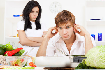 young couple in kitchen