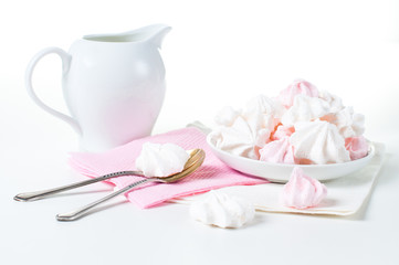 white and pink meringues