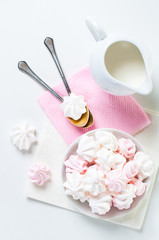 white and pink meringues