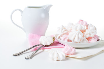 white and pink meringues