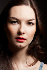 Fototapeta premium portrait of woman on dark background