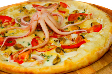 pizza Appetizing with octopus seafood on a wooden tray isolated