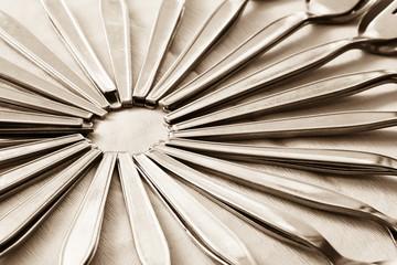 Close-up of arranging spoon and fork