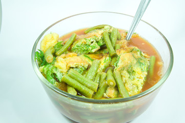 Sour soup made of tamarind paste with scramble egg and vegetable