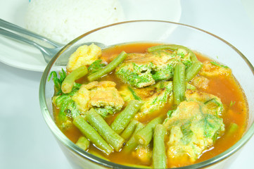 Sour soup made of tamarind paste with scramble egg and vegetable