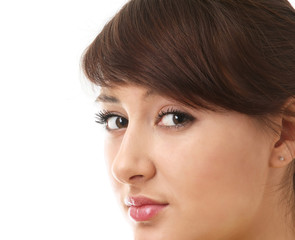Obraz premium Closeup ofa beautiful woman's face, isolated on white