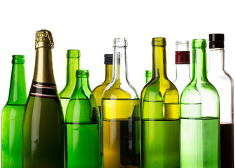 Different alcohol drinks bottles isolated on white