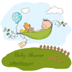 Fototapeta premium little boy sleeping in a pea been, baby announcement card