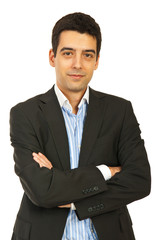 Cheerful business man with arms folded