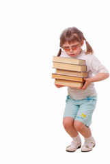 Little girl in sun glasses carries a stack of books