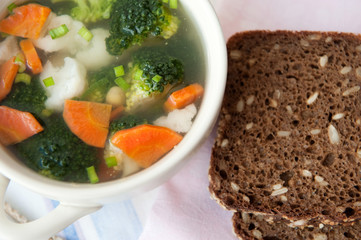 Healthy soup with wholemeal bread