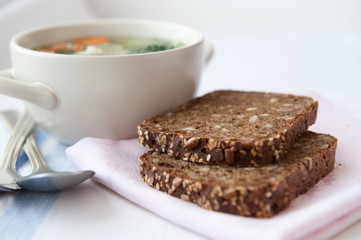 Healthy soup with wholemeal bread