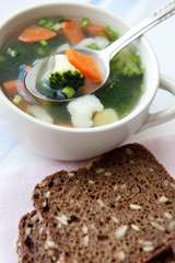 Healthy soup with wholemeal bread