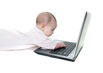 baby with laptop over white