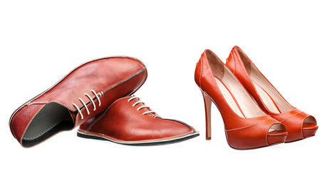 Male and female leather shoes isolated over white