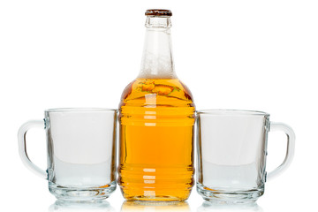 Bottle of beer and two mugs