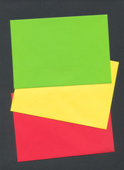 Three colourful envelopes