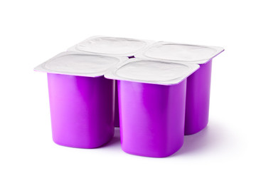 Four plastic containers for dairy products with foil lid - 40379638
