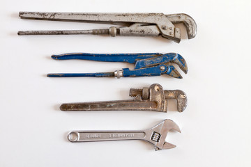 group of plumbers pipe wrench on white