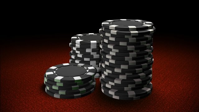 Casino chips black red table
