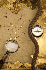 Obraz na płótnie Canvas Old navigation instrument, map and compass