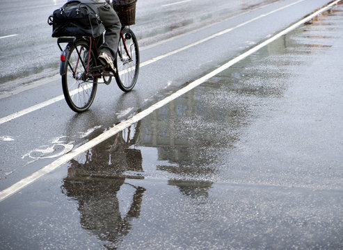 Fototapeta Cyclist in rain